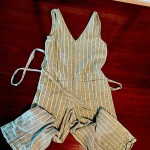 Sage green striped romper. Inseam too short for me. Worn once.